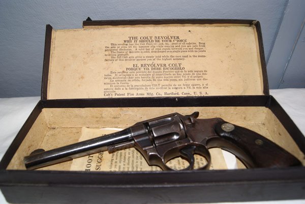 a revolver in a display case